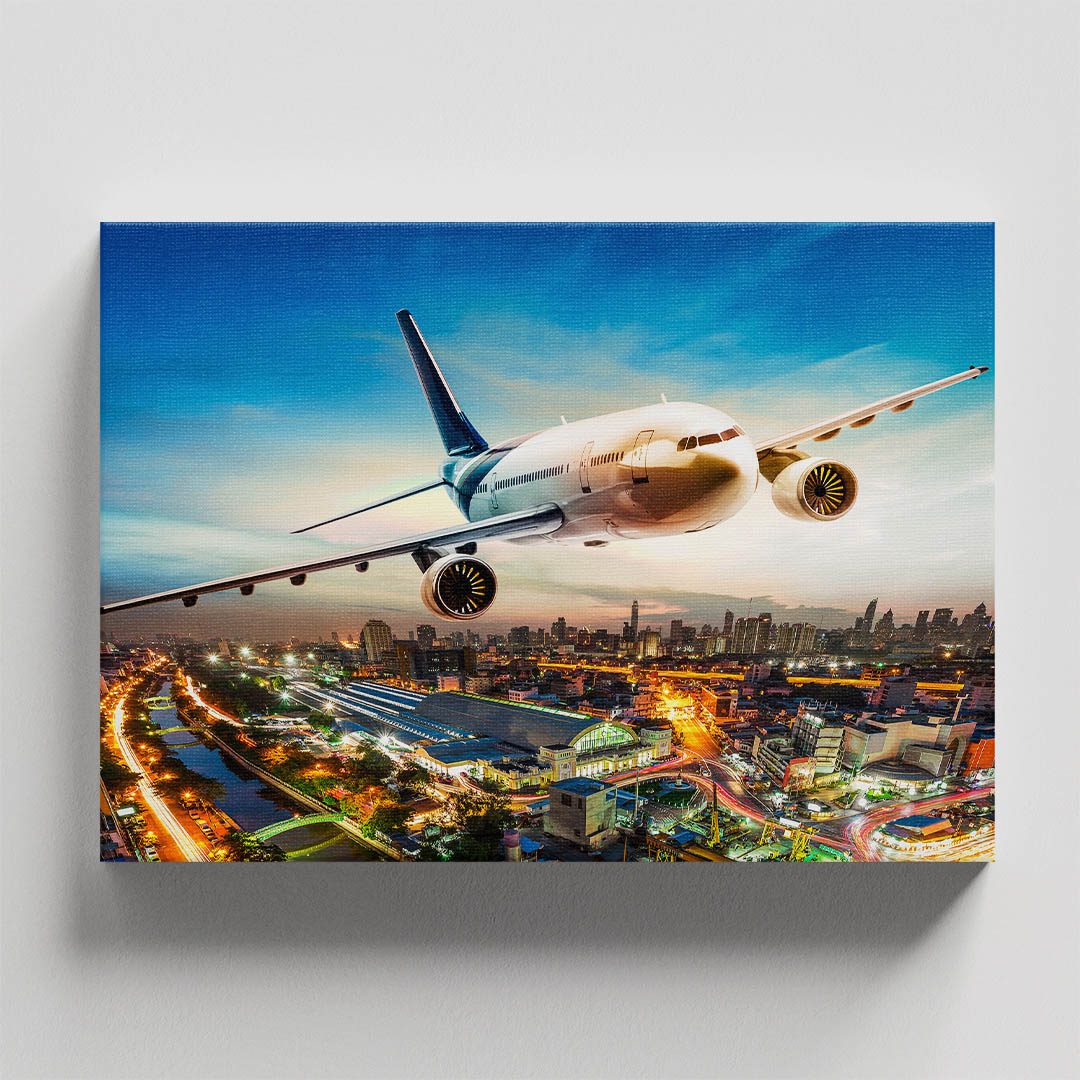 Cuadro Decorativo Avión volando sobre la ciudad 90 X 45