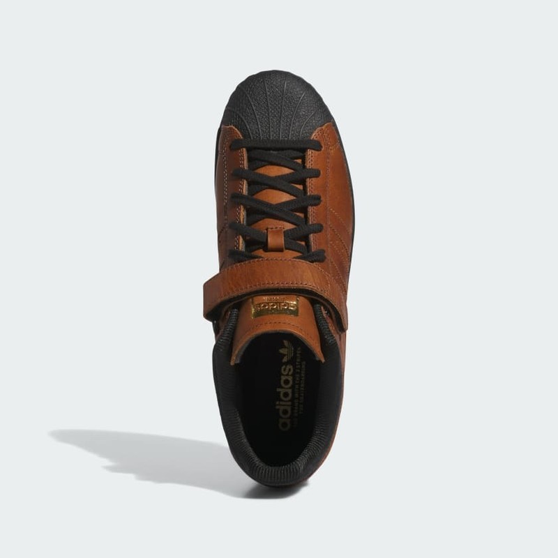 TENIS ADIDAS PRO SHELL ADV X HEITOR CONCHA SUPERSTAR CAFÉ CON NEGRO PARA HOMBRE  CAFÉ CON NEGRO PARA HOMBRE