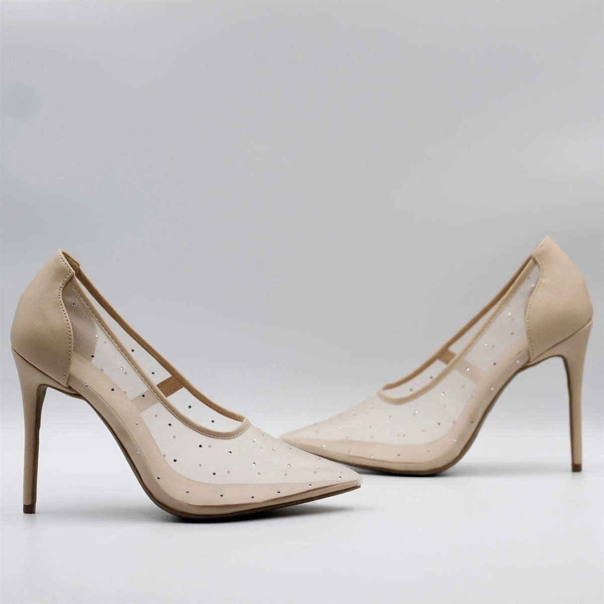 Zapatilla stiletto transparente