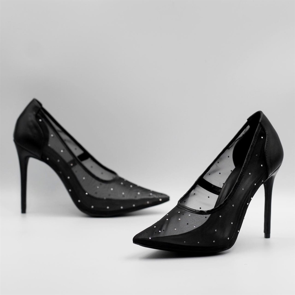 Zapatilla stiletto transparente